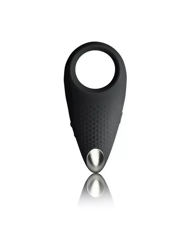 Black vibrating cock ring with textured surface and silver accent, designed for enhanced pleasure.