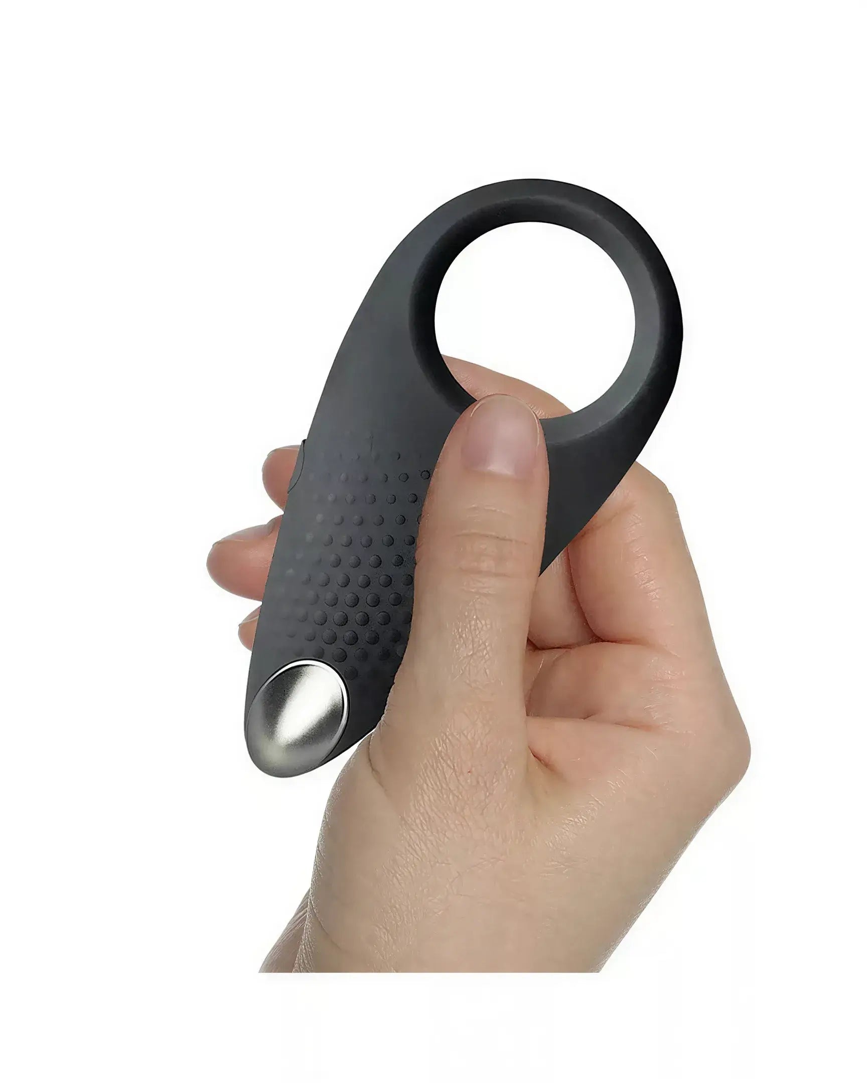 Rocks Off Men-X Empowerer vibrating cock ring held in a hand, featuring a textured surface and a metallic button.