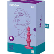 Satisfyer Lollipop Plug Vibrator 1 in pink packaging with abstract line art design and product details on the box.