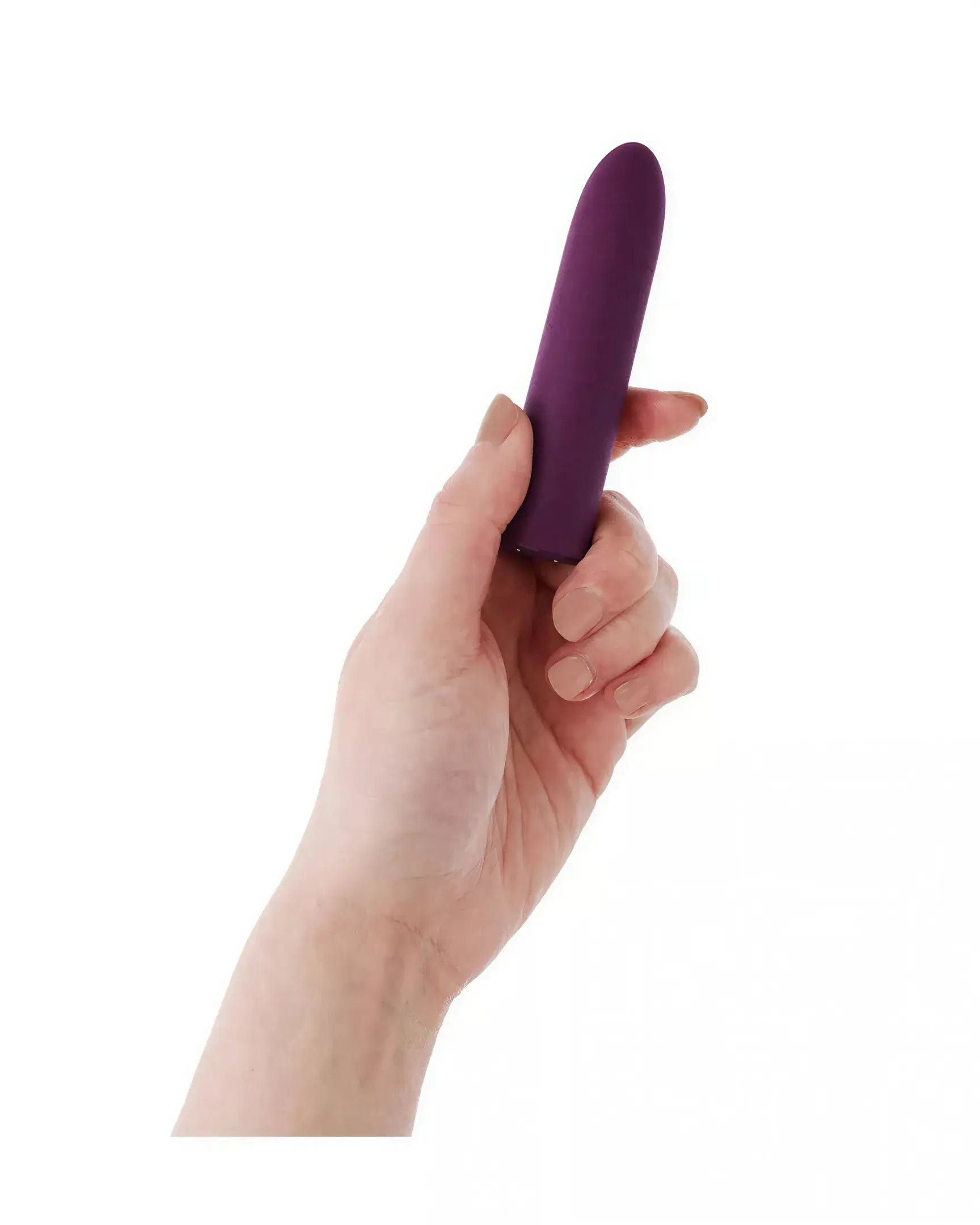 Berry Bullet vibrator held in a hand, featuring a sleek, purple design with a tapered tip.