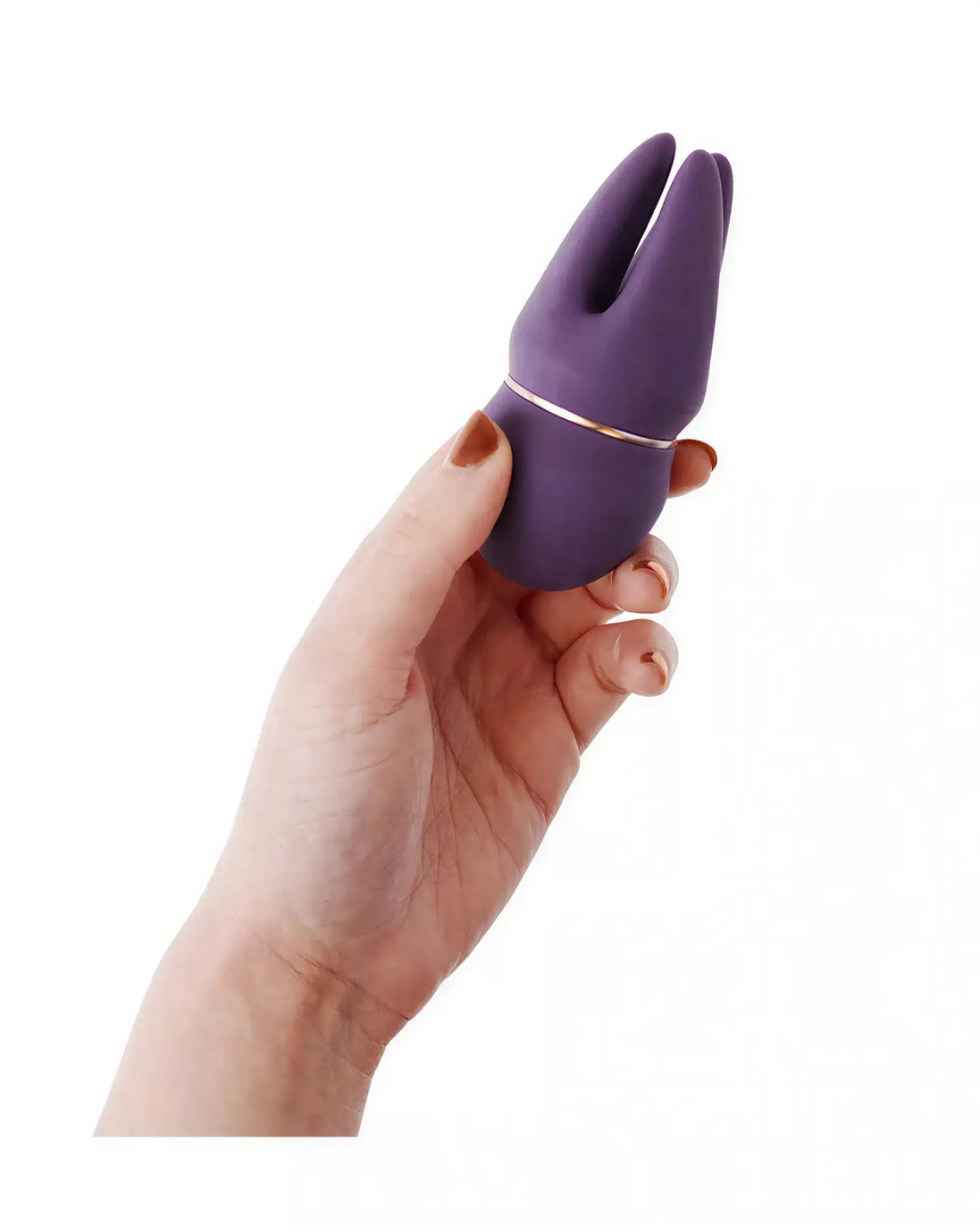 Purple Share Satisfaction Candi clitoral vibrator held in a hand, featuring a sleek design and gold accent.