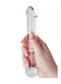 Lucent Mars glass dildo held in a hand, featuring a clear design with rounded ends and smooth surface.