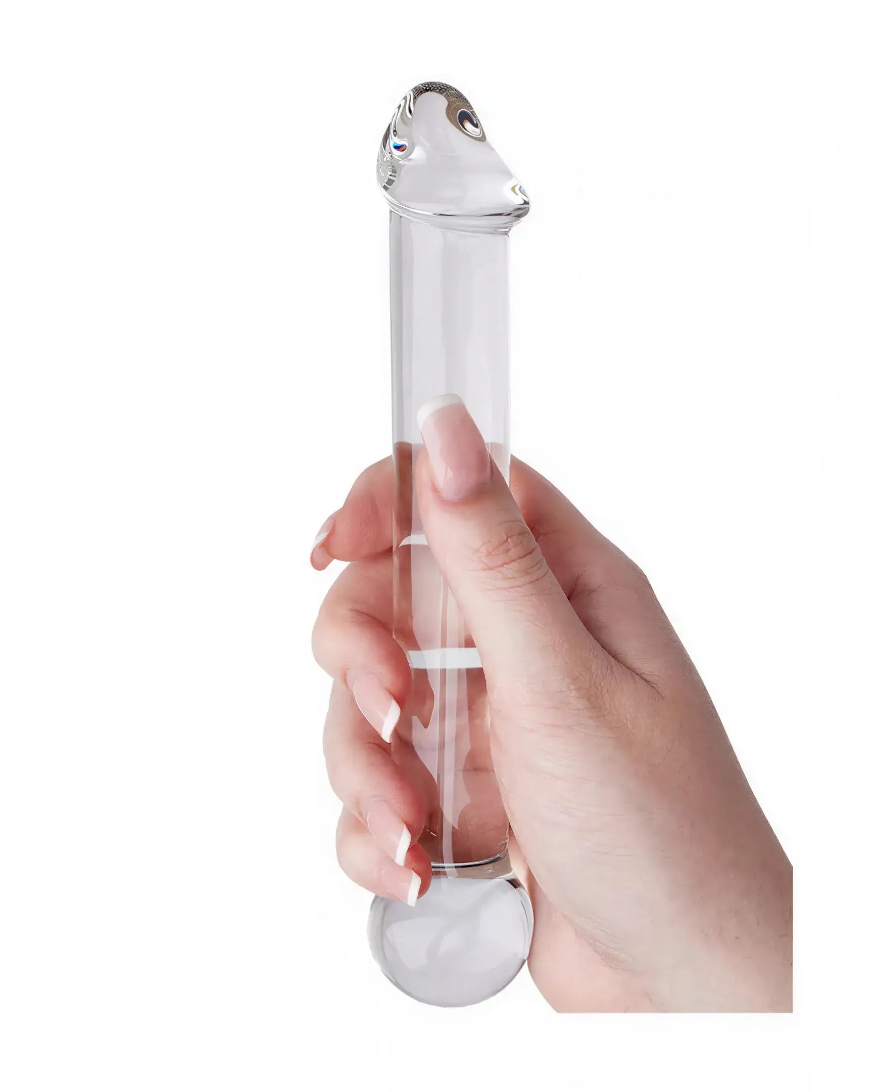 Lucent Mars glass dildo held in a hand, featuring a clear design with rounded ends and smooth surface.