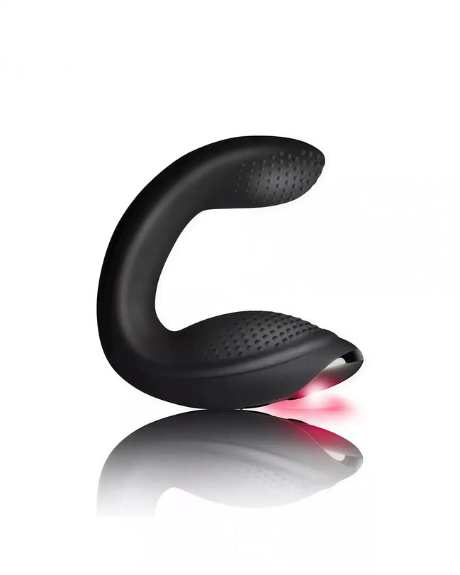 Rocks Off Rude Boy Xtreme prostate vibrator in black with textured surface and red light feature.