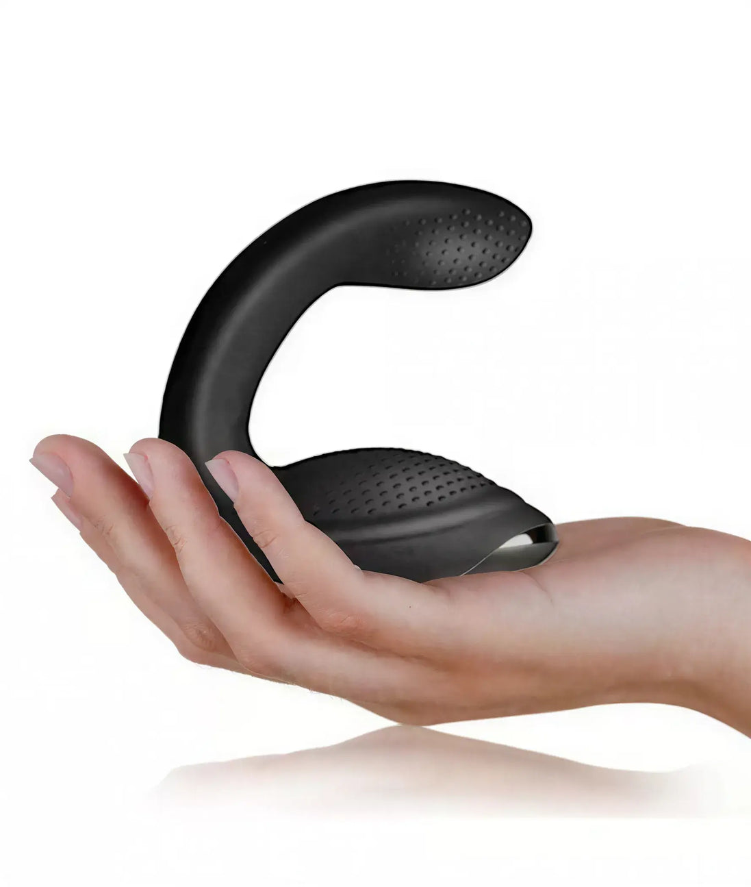 Rocks Off Rude Boy Xtreme prostate vibrator held in a hand, featuring a curved design and textured surface.