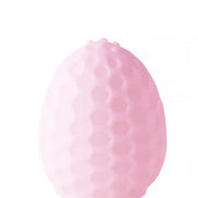 Share Satisfaction honey egg stroker in soft pink, featuring a textured honeycomb design and rounded top.