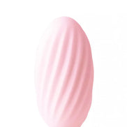 Reversible waves stroker in soft pink with a textured, ribbed surface for enhanced grip and stimulation.