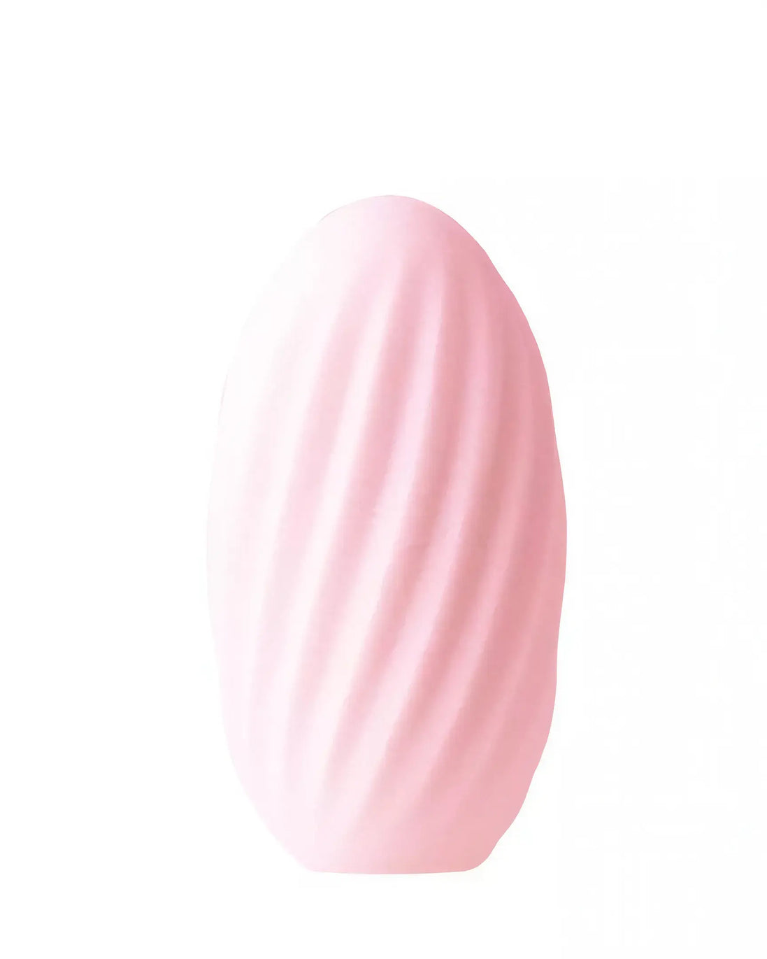 Reversible waves stroker in soft pink with a textured, ribbed surface for enhanced grip and stimulation.