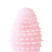 Reversible honey stroker in soft pink silicone with textured surface for enhanced stimulation.
