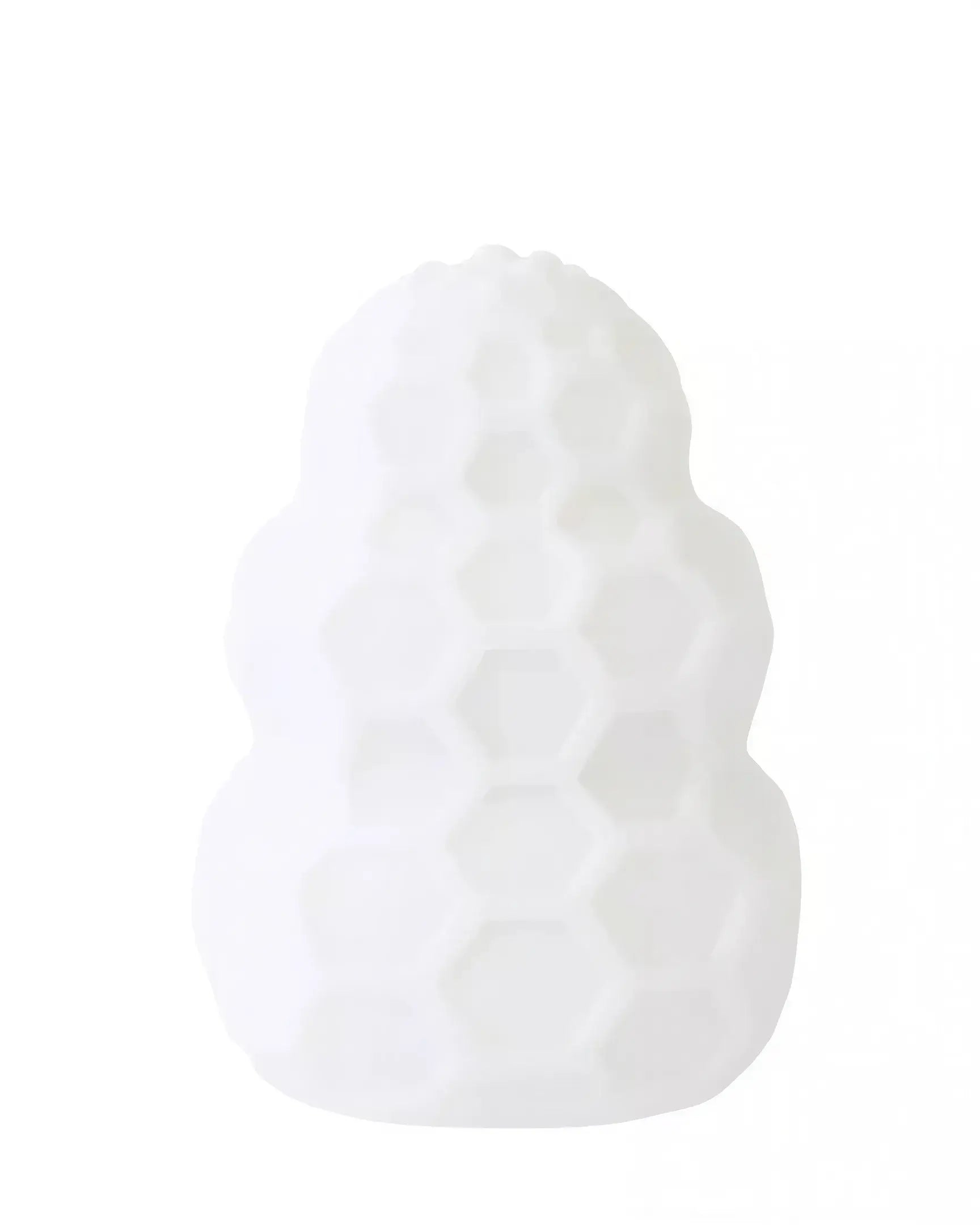 Reversible honey stroker in white silicone with a honeycomb texture, designed for enhanced grip and stimulation.