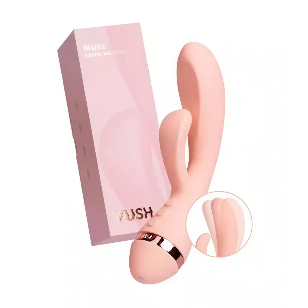Vush Muse rabbit vibrator in soft pink with dual stimulation features and a sleek packaging box.