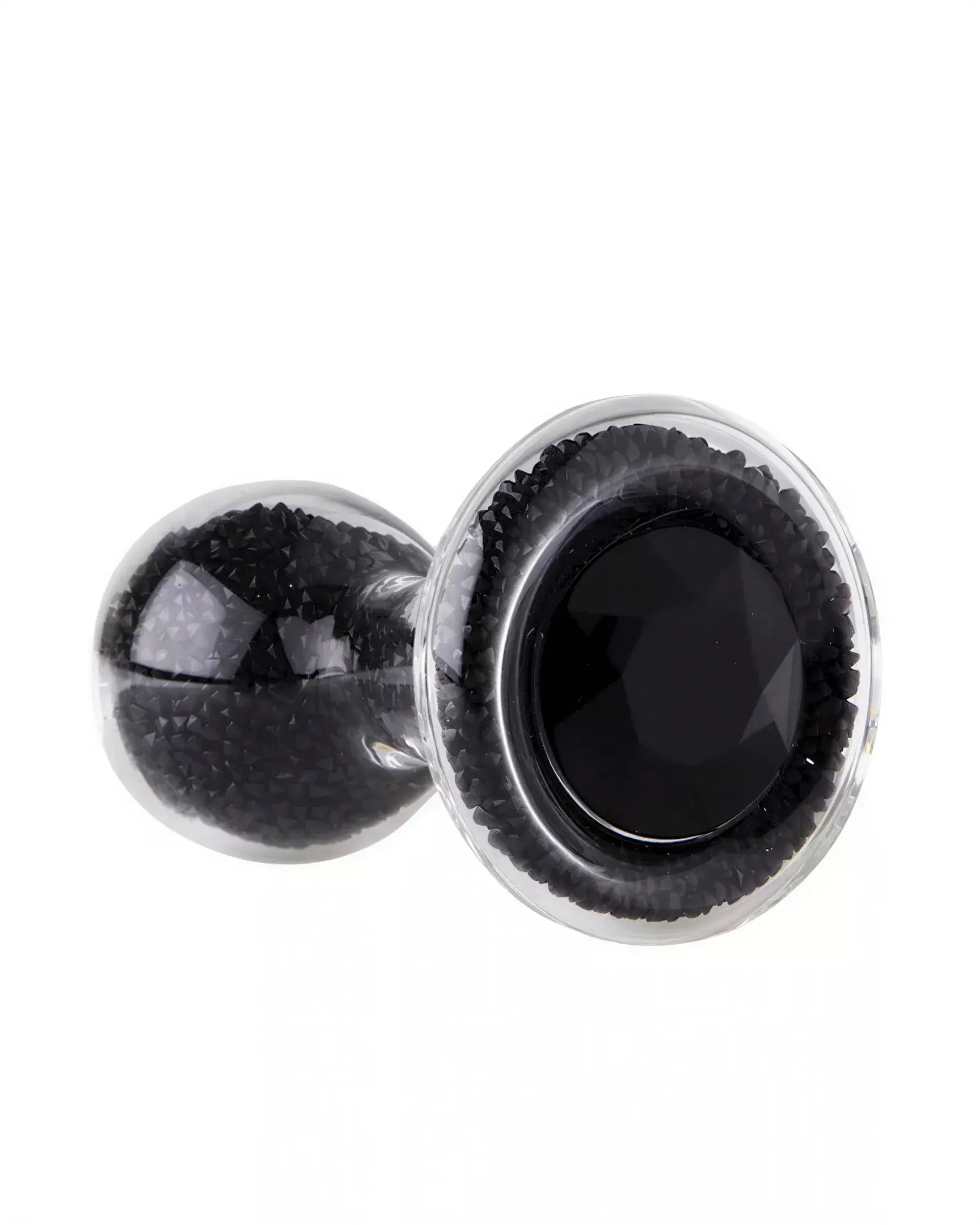 Lucent glass butt plug in black with a faceted gem base, showcasing a smooth, glossy surface.