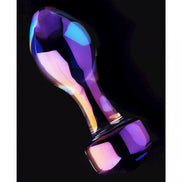 Clear prism glass butt plug with a faceted design, reflecting purple and blue hues against a dark background.
