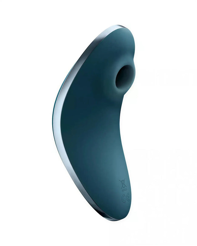 Satisfyer Vulva Lover 1 in teal with a curved design and a circular opening, angled for ergonomic use.