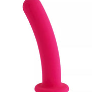 Pink silicone dildo on a white background