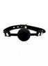 Black silicone ball gag with padlock and silver studs on an adjustable strap.