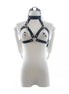 Black bondage harness with nipple clamps, displayed on a mannequin torso against a white background.