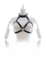 Black leather harness on a mannequin against a white background