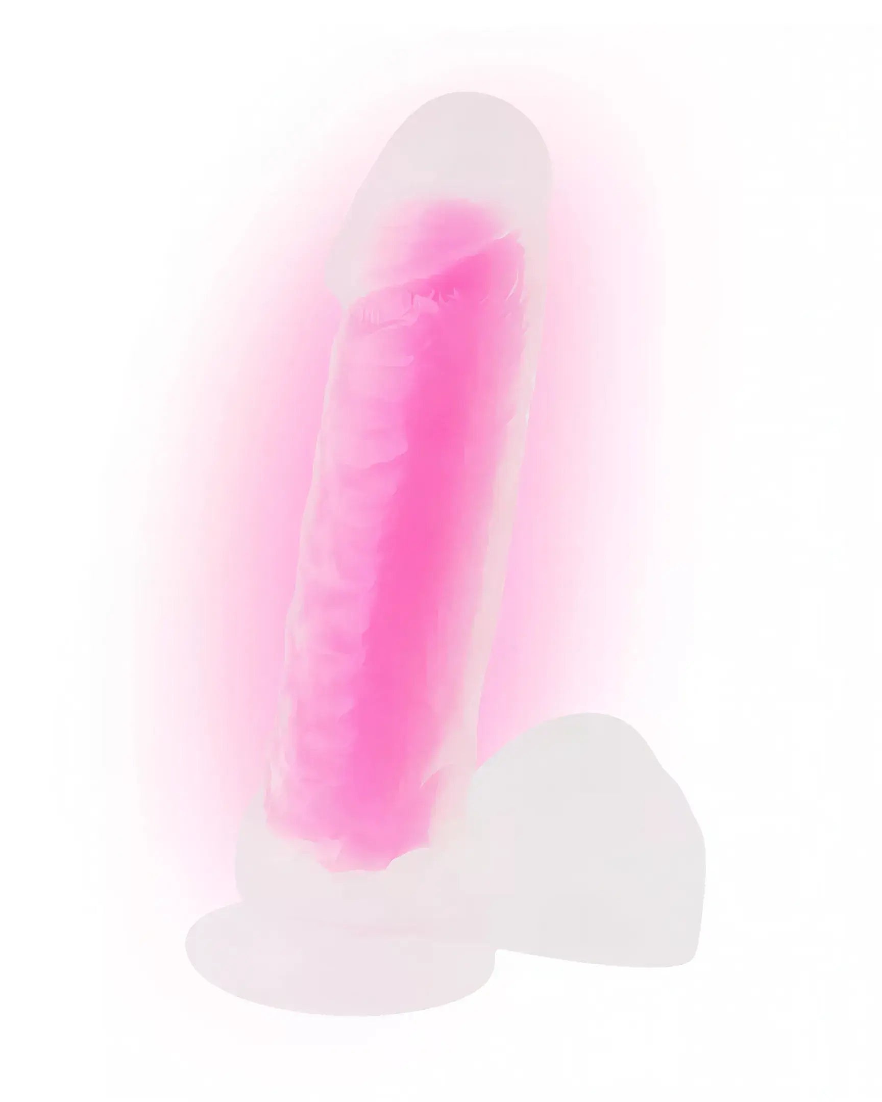 Nood Colours glow in the dark dildo, 8.1 inches, featuring a translucent pink body with a smooth texture.