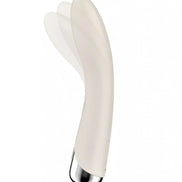Satisfyer Spinning Vibe 1 in white with a sleek design and metallic base, angled for visibility.