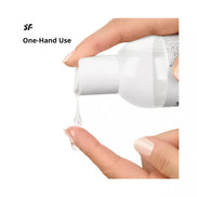 Satisfyer Juicy Lubricant, 300ml bottle being squeezed with a drop forming on a fingertip.