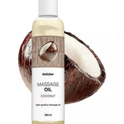 Satisfyer coconut massage oil 250ml bottle next to a halved coconut shell.