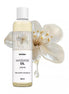 Satisfyer massage oil in a clear bottle with a jasmine flower, labeled 250ml, against a white background.