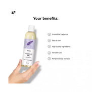 Satisfyer lavender massage oil bottle with a hand holding it, featuring a label and bullet points on benefits.