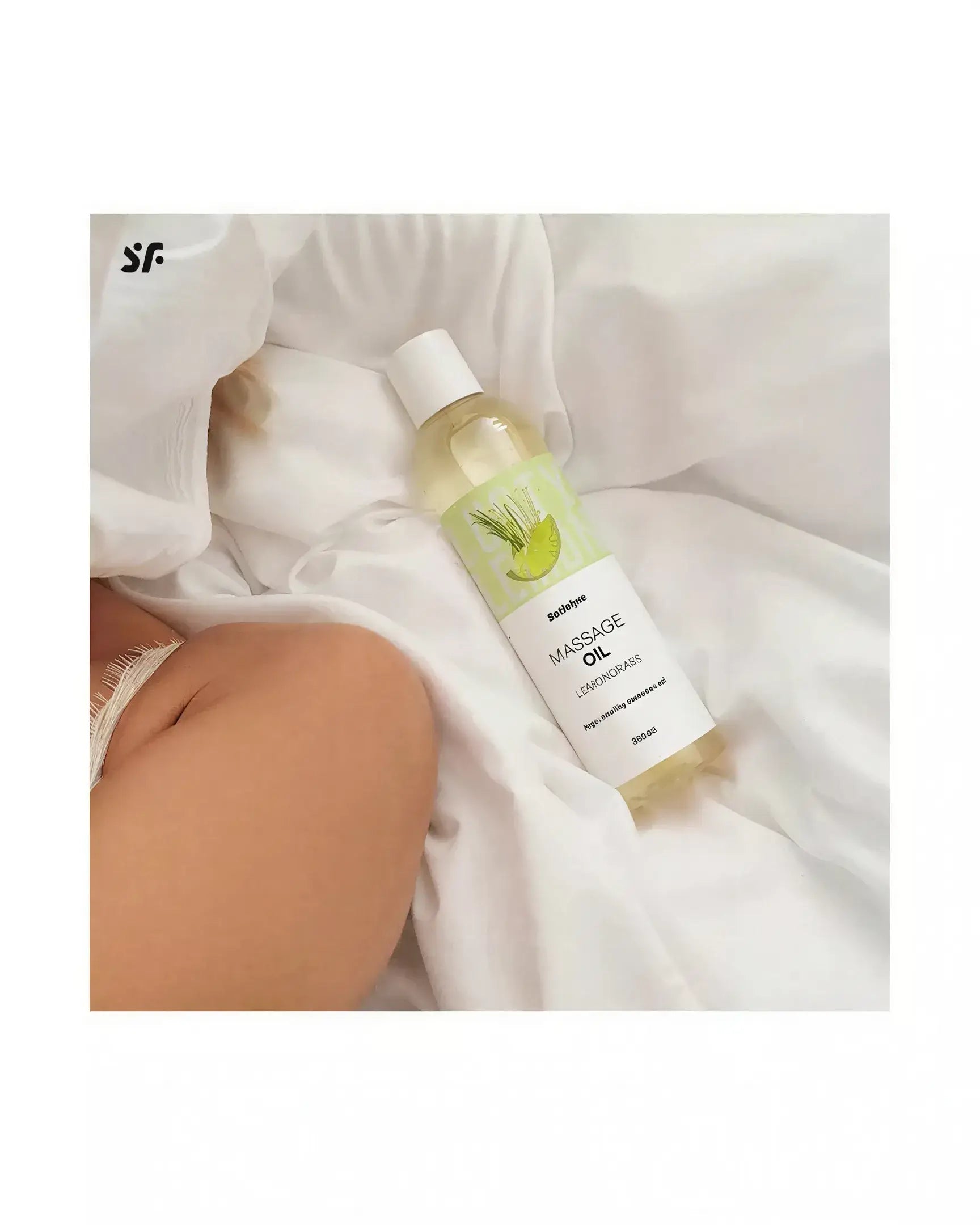 Satisfyer massage oil in lemongrass scent, 250ml bottle on a white fabric background.
