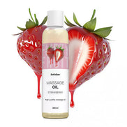 Satisfyer massage oil in a 250ml bottle, with a strawberry design and two strawberries in the background.