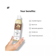 Satisfyer massage oil in vanilla, 250ml bottle held in hand with benefits listed on the side.