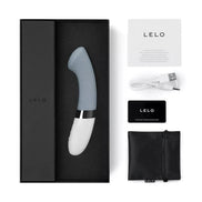 Lelo Gigi 2 G-spot vibrator in a sleek gray and white design, displayed in a black box with accessories and documentation.