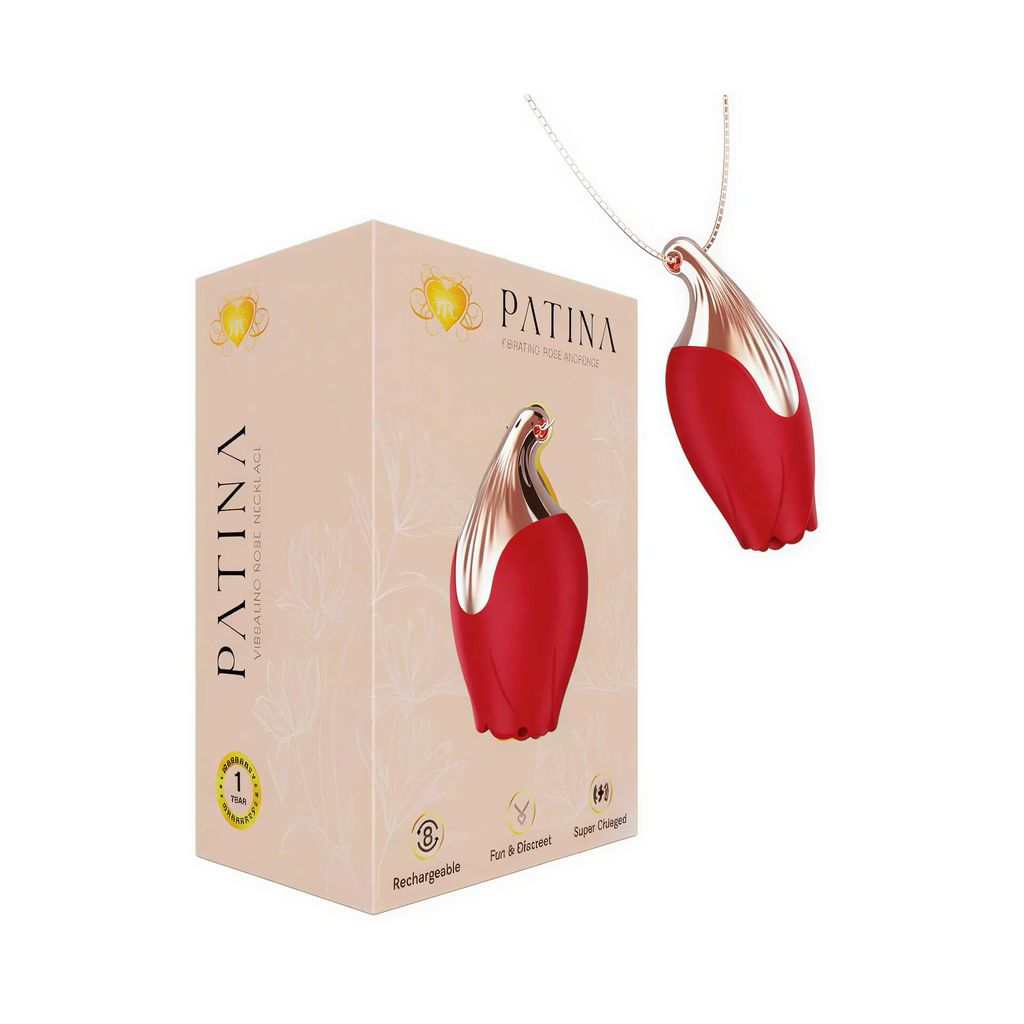 Patina necklace vibrator in red and gold, displayed with its packaging on a white background.