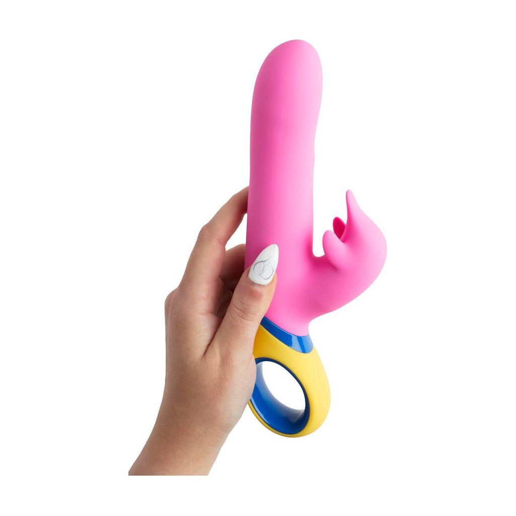 Hanu Rabbit Vibrator in pink and blue held in a hand, featuring a curved shaft and rabbit ears for stimulation.