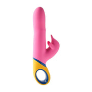 Pink and yellow Hanu rabbit vibrator with a curved shaft and a small clitoral stimulator.
